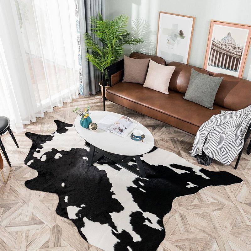Tapete de piel negro con blanco